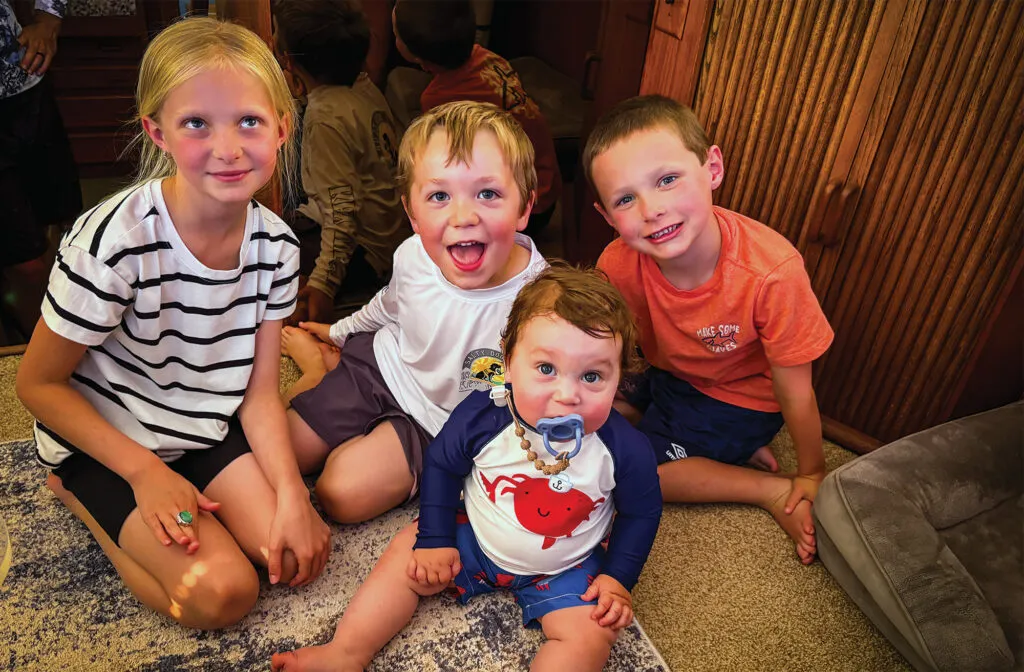Four kids posing for a photo